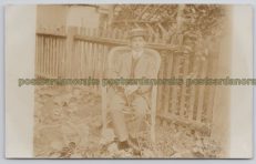 Man Sat In Garden Postcard RPPC